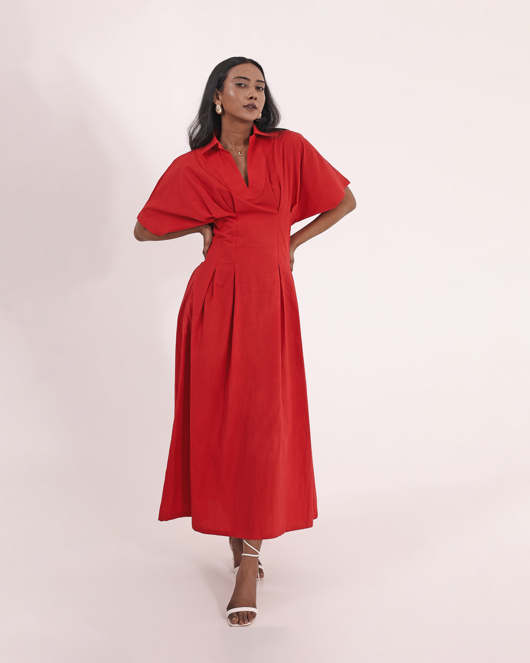 Woman wearing a Red Cotton Maxi Dress with kimono sleeves  with white heels.